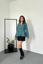 Veste bleue avec nœud dans le dos en gros