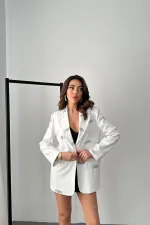 Veste détaillée avec étiquette écrue en gros