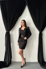 Ensemble veste et pantalon garnis de cuir noir triple en gros