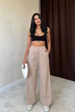 Pantalon beige à rayures latérales en gros