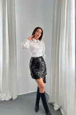 Jupe courte noire à paillettes en gros