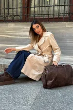 Trench-coat long beige à ceinture en gros
