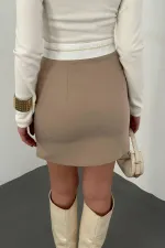 Mini-jupe beige ceinturée en gros