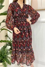 Robe en mousseline noire à motifs en gros