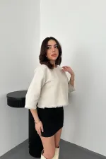 Chemisier blanc à pompons en gros