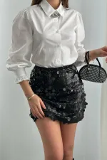 Jupe courte noire à paillettes en gros