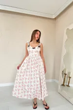 Robe fleurie beige en gros avec nœud sur le devant