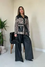 Costume léopard garni de cuir noir en gros