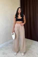 Pantalon beige à rayures latérales en gros