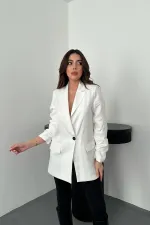 Veste Atlas écrue à manches froncées en gros