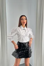 Jupe courte noire à paillettes en gros