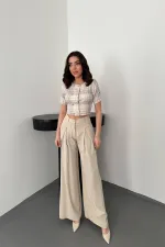 Chemisier blanc rayé et boutonné en gros