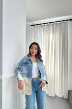 Veste en jean bleu tricotée garnie en gros