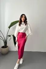 Jupe fendue et brodée fuchsia en gros