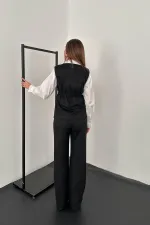 Ensemble gilet et pantalon en daim noir en vente en gros