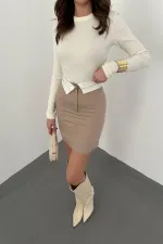 Mini-jupe beige ceinturée en gros