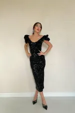 Robe noire sans manches à paillettes en gros