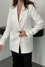 Veste Atlas écrue à manches froncées en gros