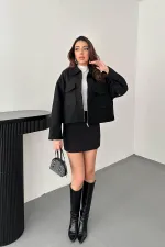 Veste en cachemire noir avec rabat de poche en gros