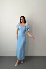 Robe bleu ciel brodée à manches en gros