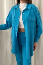 Ensemble chemise bleue et pantalon à pression en gros