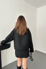 Veste en cachemire noir avec rabat de poche en gros