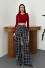 Pantalon bleu marine à ceinture et liens latéraux en gros