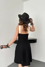 Robe à bretelles brodée noire écrue en gros
