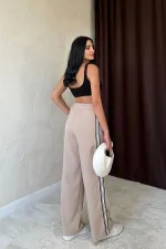 Pantalon beige à rayures latérales en gros