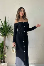 Robe noire en tricot à boutons dorés en gros