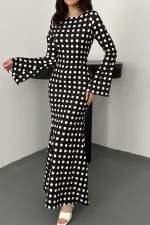 Robe moulante noire à pois en gros