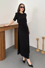 Robe noire plissée à col rond en gros