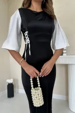 Robe en satin noir et blanc avec détails en dentelle en gros