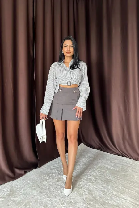 Jupe plissée à boutons fumés en gros