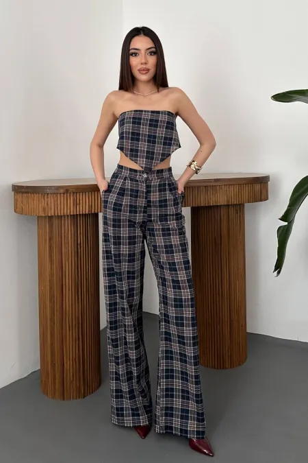 Pantalon bleu marine à ceinture et liens latéraux en gros