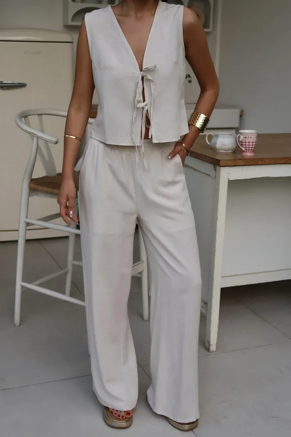 Costume en lin beige avec nœud sur le devant, vente en gros