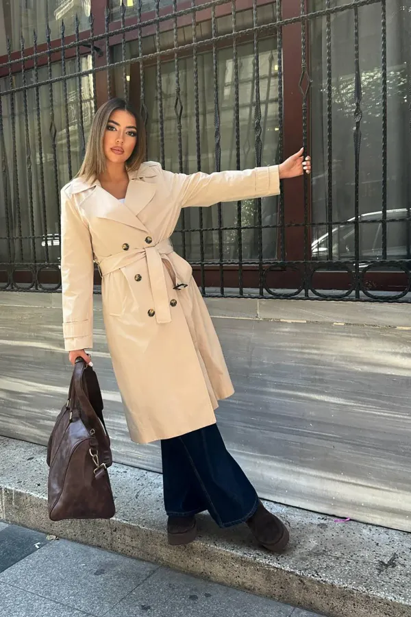 Trench-coat long beige à ceinture en gros