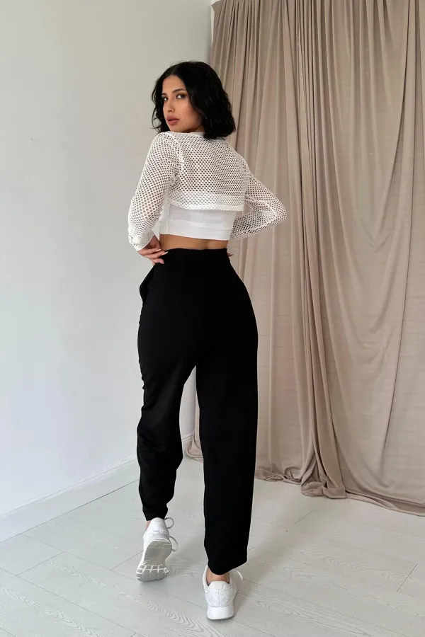 Pantalon noir plissé élastique avec détails en gros