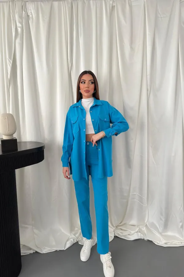 Ensemble chemise bleue et pantalon à pression en gros