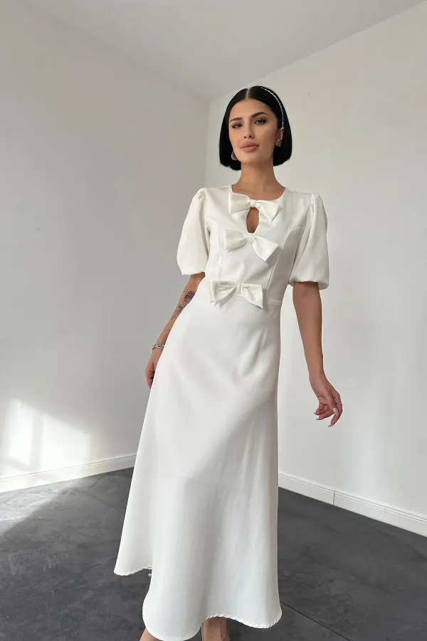 Robe mi-longue blanche à nœud en gros