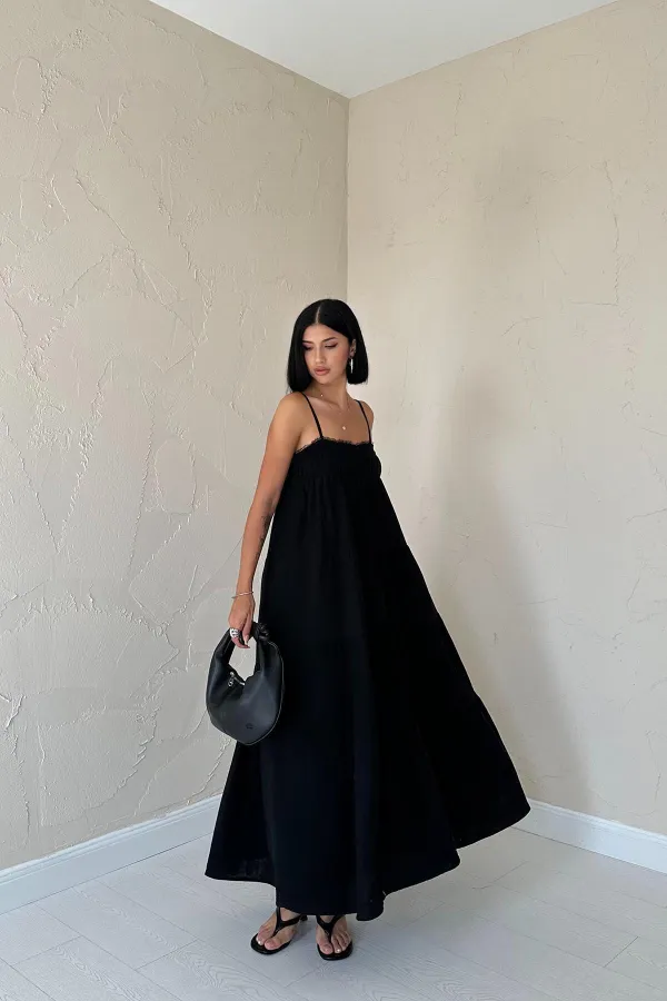 Robe en mousseline noire à bretelles en gros