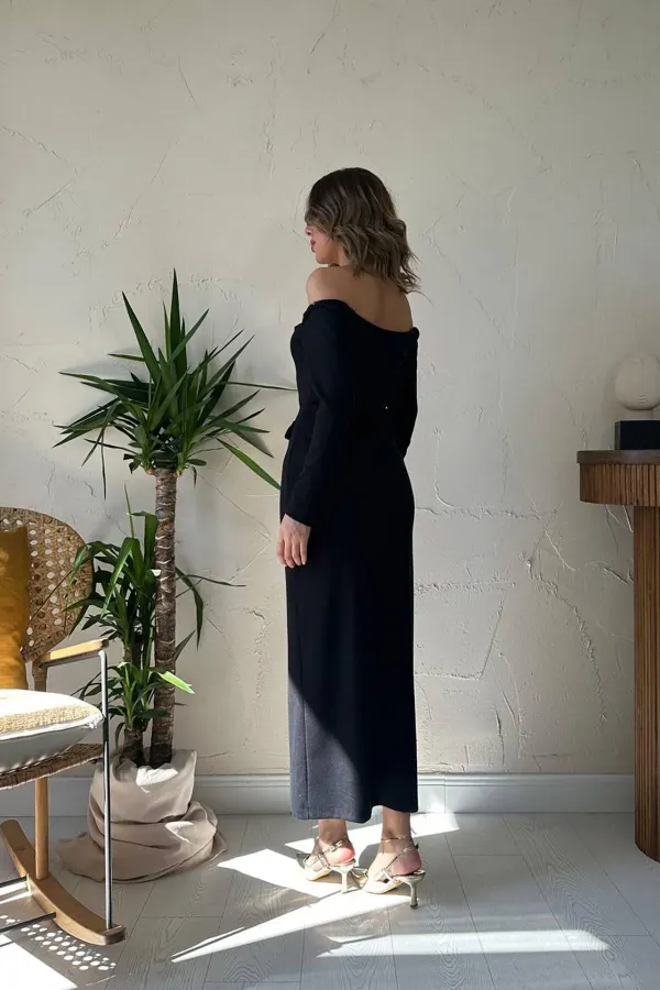 Robe noire en tricot à boutons dorés en gros