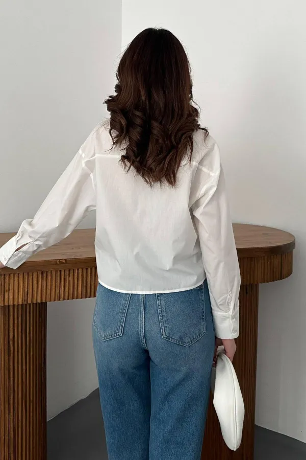 Chemise en popeline blanche avec poche fléchée, vente en gros