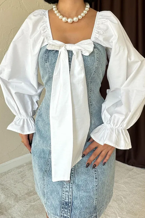 Robe en jean bleue avec nœud sur le devant en gros