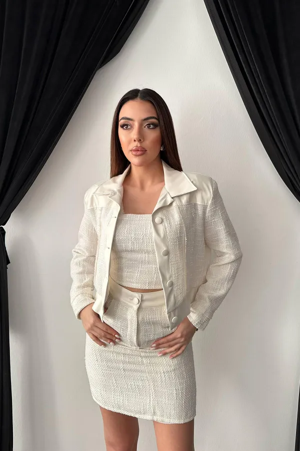 Ensemble veste et pantalon garnis de cuir triple écru en gros