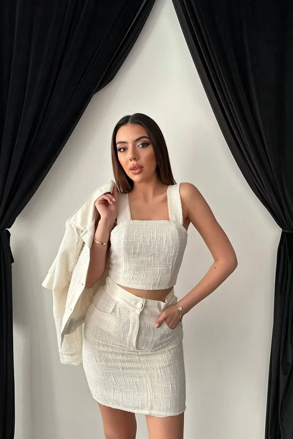 Ensemble veste et pantalon garnis de cuir triple écru en gros