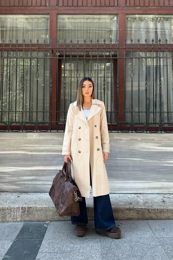 Trench-coat long beige à ceinture en gros