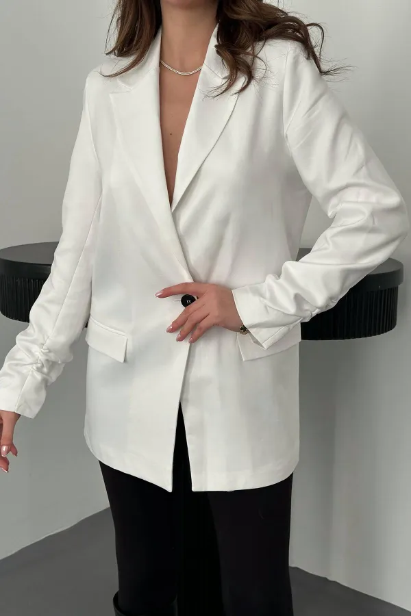 Veste Atlas écrue à manches froncées en gros