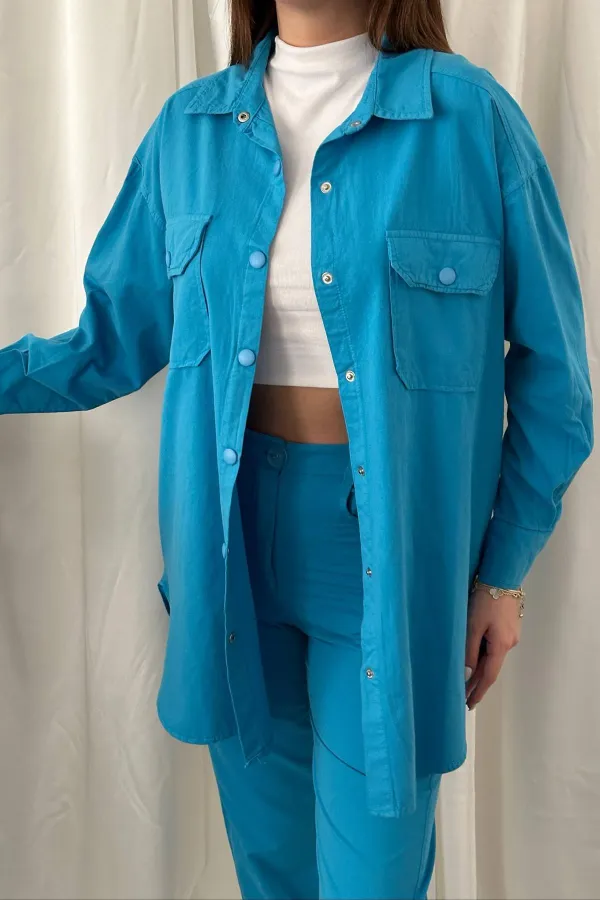 Ensemble chemise bleue et pantalon à pression en gros