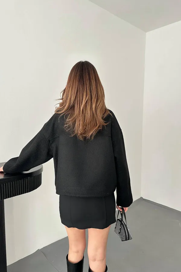 Veste en cachemire noir avec rabat de poche en gros